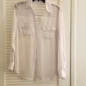 White and black polka dot blouse